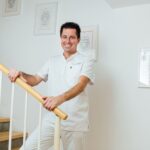 Einzelportrait von Dr. Bernd Kinast mit ruhigem, freundlichem Gesichtsausdruck